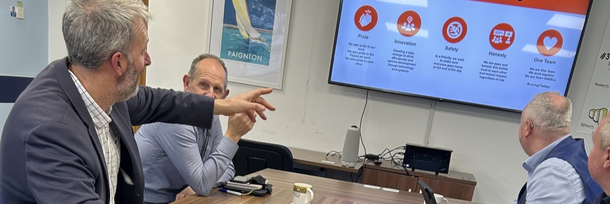 senior leadership team in board meeting